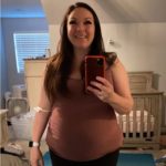 Skye takes a selfie in mirror before weight loss